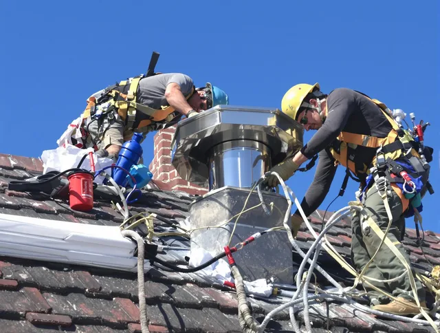Protective chimney cap installed by Weston Chimney Sweep in Weston, MA