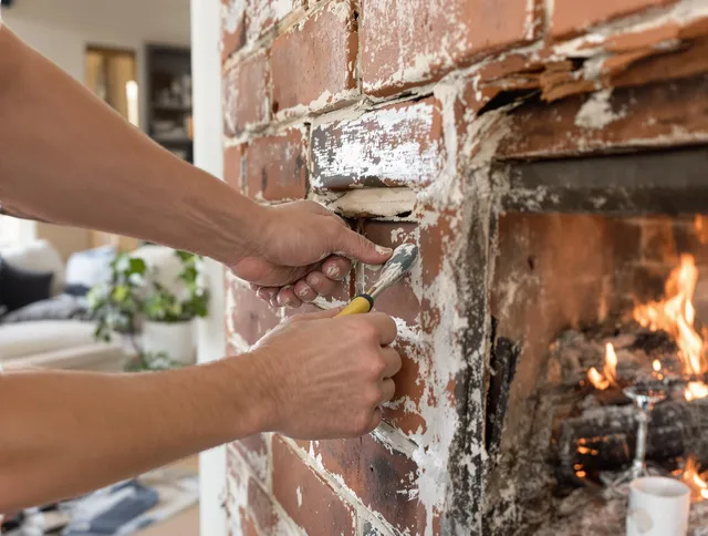 Routine fireplace repair by Weston Chimney Sweep in Weston, MA